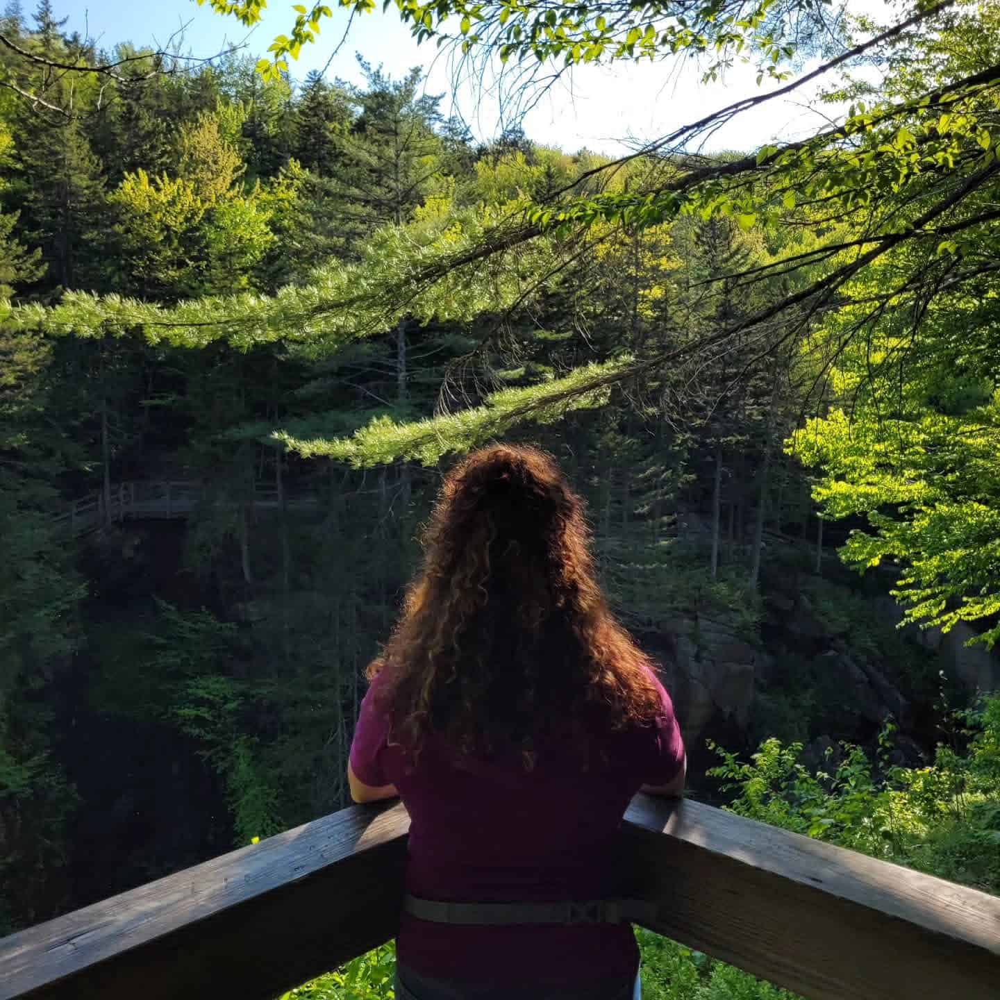 Heather taking in the view on a hike