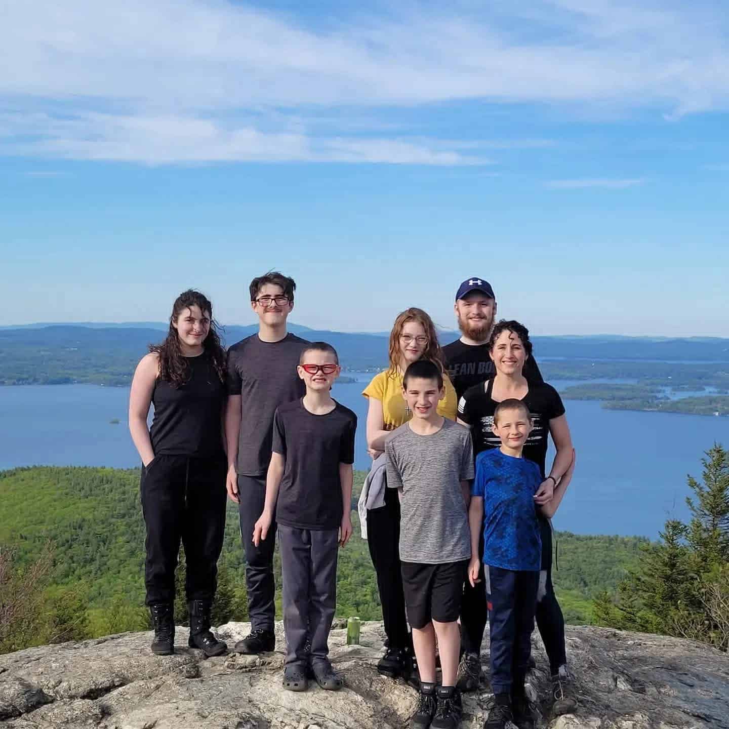 Family hiking trip summit photo